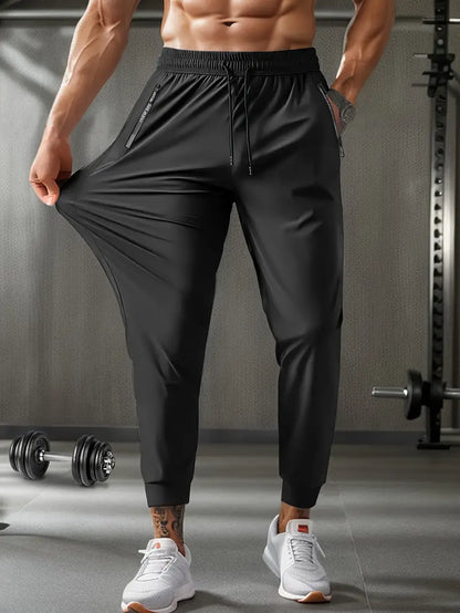 Men'S Casual Sports Nine-Point Pants with Breathable Elastic Fabric, Drawstring Waist, And Zipper Pockets