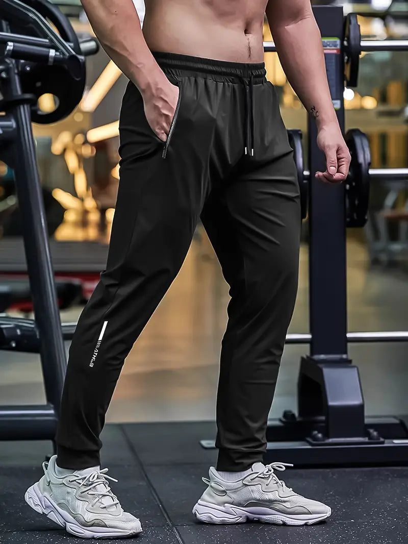 Men'S Casual Sports Nine-Point Pants with Breathable Elastic Fabric, Drawstring Waist, And Zipper Pockets