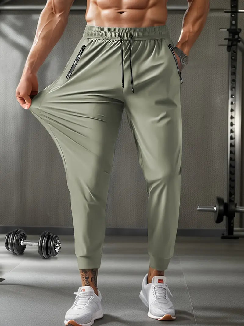 Men'S Casual Sports Nine-Point Pants with Breathable Elastic Fabric, Drawstring Waist, And Zipper Pockets